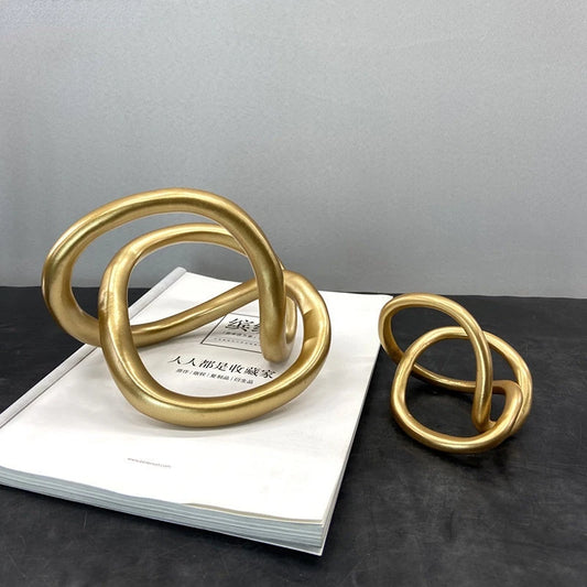 Golden Resin Knot Sculpture – Handmade Geometric Decorative Figurine